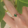 Bague en or jaune 18k serti au centre d'une tsavorite, de spessartites et de diamants sur le corps