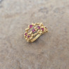 Bague en or jaune 18k grumes sertie de rubis